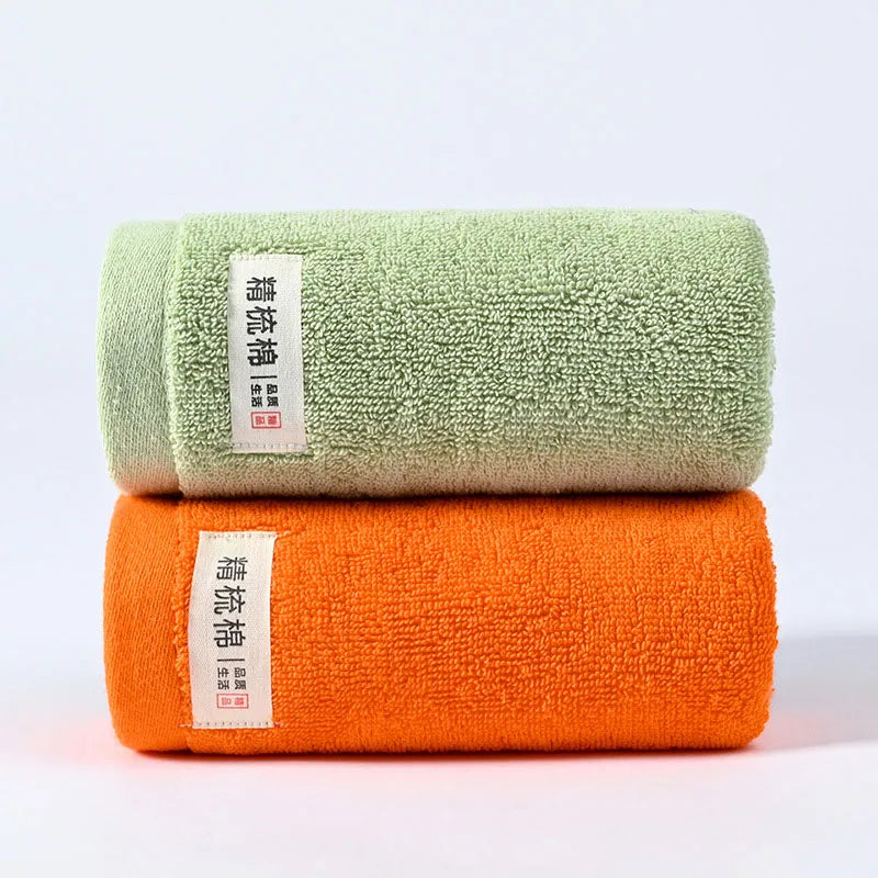 serviettes bain coton douces absorber vert clair jaune gris orange blanc texture duveteuse moderne