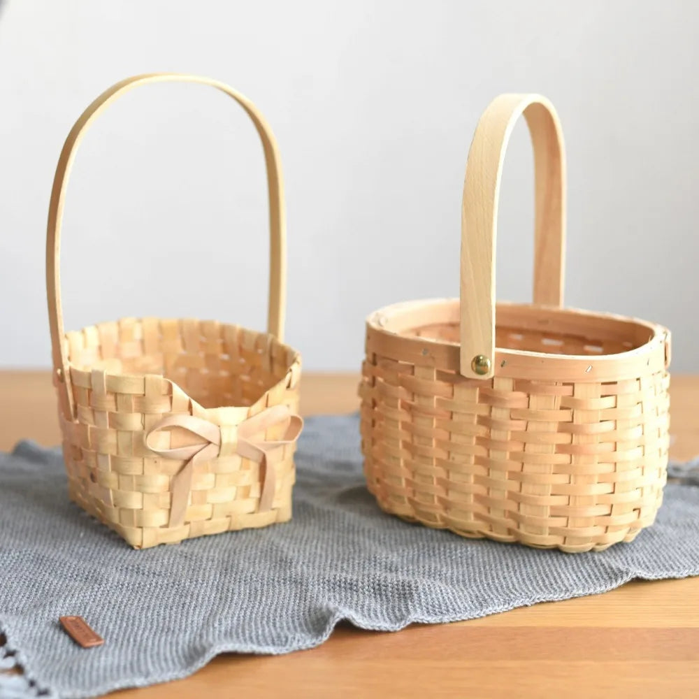 panier tressé bois naturel réutilisable traditionnel poignée anneaux métalliques rustique utilisation multiple fleuriers decoration