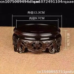 support bois ornements sculptés complexe artisanal marron foncé traditionnel décoration maison objet décoratif stand