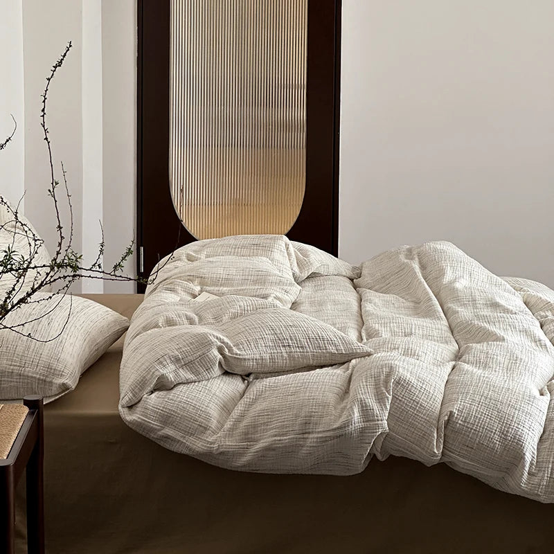 Parure de lit gaze coton vintage 4 pièces sur un lit double