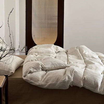 Parure de lit gaze coton vintage 4 pièces sur un lit double