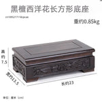 support d'affichage bois sculpté artisanal marron foncé décoration vase théière ornement