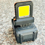 lampe travail led moderne robuste noir orange gris mat rechargeable batterie intégrée tringle fixations