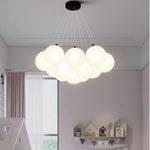 suspension lumineuse moderne blanc boules verre translucides 19 têtes fixée câbles