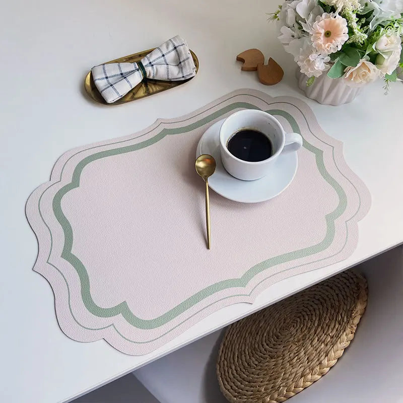 serviettes table moderne motif géométrique rose clair vert bleu beige ornementées