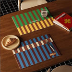 tapis table moderne rayures horizontales vert marron bleu beige respectueux environnement