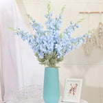 Bouquet fleurs artificielles bleu décoration salon moderne