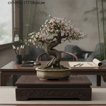support d'affichage bois sculpté artisanal marron foncé décoration vase théière ornement