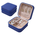 boîte bijoux simili cuir vert pastel moderne fermeture glissière blanc rose pâle boucles doreilles