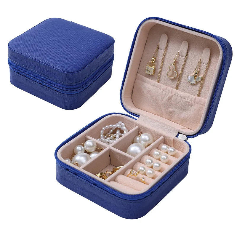 boîte bijoux simili cuir vert pastel moderne fermeture glissière blanc rose pâle boucles doreilles