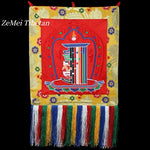 tapisserie décorative tibétaine motifs floraux franges colorées rouge jaune bleu vert blanc