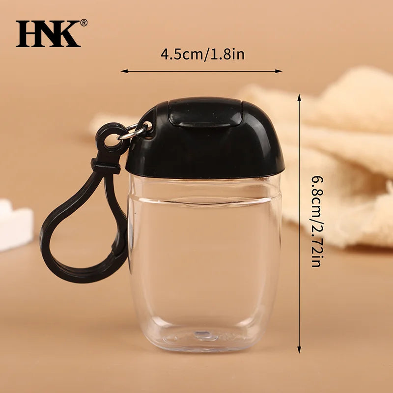 bouteilles rechargeables transparentes modernes couleurs variées anneaux boucles pratique mini désinfectant main cosmétique alcool