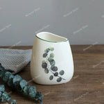 ensemble vaisselle salle bain blanc motifs floraux moderne distributeur savon tasses dents bol savon