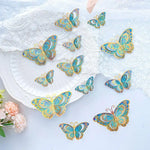 papillons décoratifs transparents effet holographique adhésifs 3d élégants rose vert bleu doré pack 12