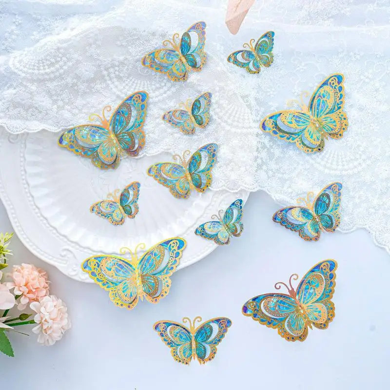 papillons décoratifs transparents effet holographique adhésifs 3d élégants rose vert bleu doré pack 12
