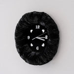 horloge murale texturée moderne noir blanc argenté chambre coucher décoration intérieure chic frontalisée