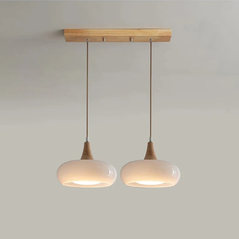 suspension lumineuse moderne orange bois naturel opacité chaînes métalliques salon restaurant étude chambre exposition