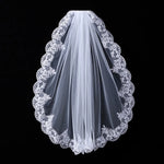 voile mariée dentelle fine blanc ornements floraux translucide classique peigne métallique élégante bride