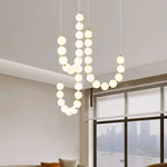 suspension lumineuse moderne minimaliste cactus blanc opalescent câbles dorés chambre salon