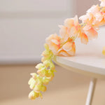 guirlande artificielle fleurs rouge orange bleu rose moderne extérieur accrochée decoration maison jardin mariage