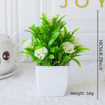 décoration extérieure plante artificielle moderne pot carré blanc branches feuilles vertes fleurs violettes minimalisteextérieur