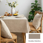 nappe réutilisable lin beige scandinave minimaliste rustique coussins chaises assiettes citrons bougies