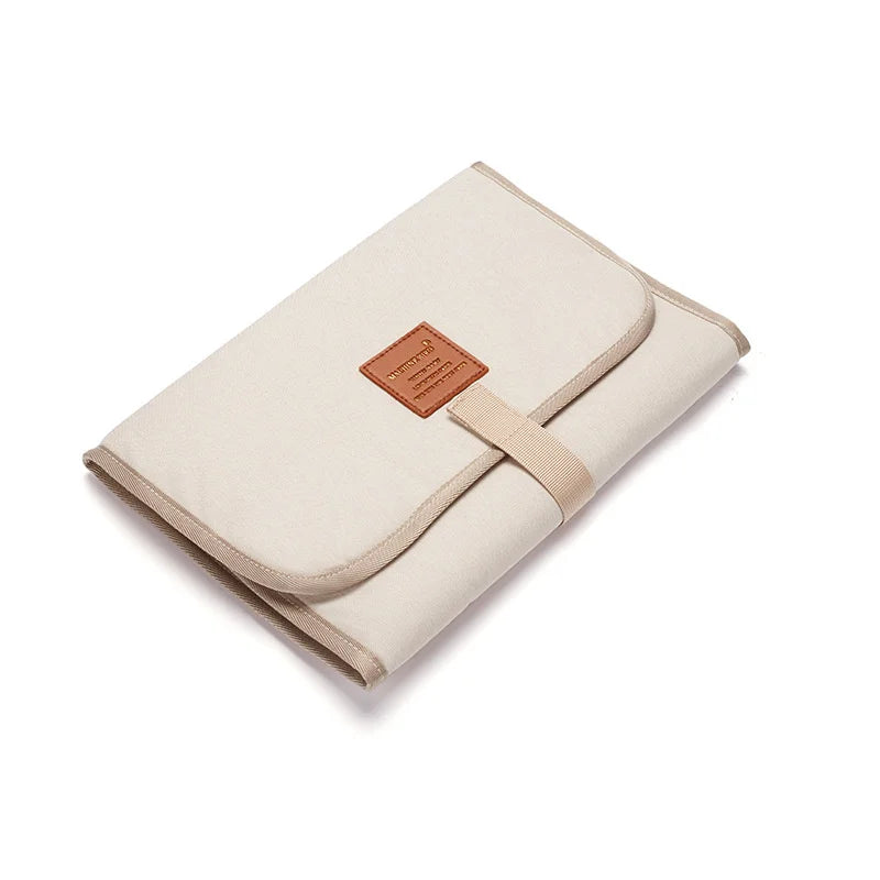coussin bain pliable moderne pratique beige clair toile simple ruban adhésif