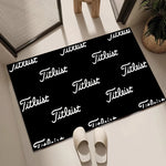 tapis sol moderne noir blanc logo titleist décor intérieur maison entrée salon luxe