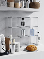 organisateur rangement modulaire transparent bleu clips métalliques compartiments tasses bouteilles bol assiette gâteau tablette