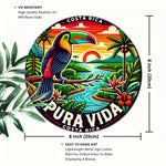 plaque métallique ronde illustration toucan paysage tropical coucher soleil fleurs exotiques multicolore rouge jaune