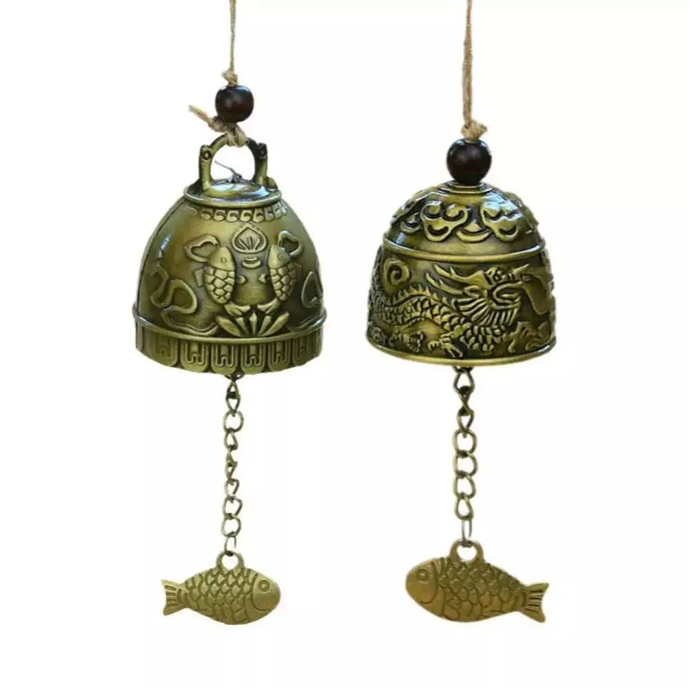 cloche décorative artisanale bronze doré ornements floraux poissons vintage pendentif métallique