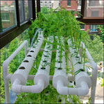 système hydroponique culture légumes balcon planter vert pvc pipe structure connecteurs pots eau pompe