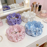 sac bijoux violet blanc moderne élégant satiné rangement bague chaîne réutilisable