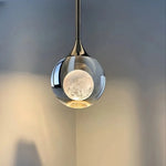 lampe suspendue moderne minimaliste transparente noir argenté brillante chambre restaurant étude cuisine