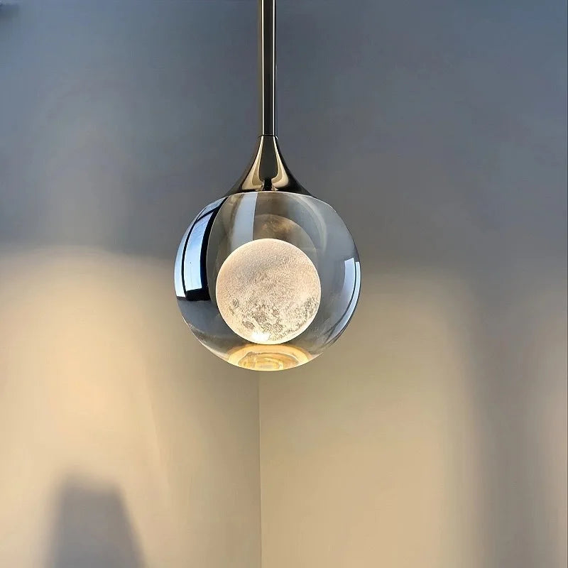 lampe suspendue moderne minimaliste transparente noir argenté brillante chambre restaurant étude cuisine