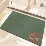 tapis bain dessin animé lapins gris jaune vert bleu rayures enfantin absorbant