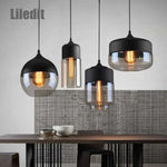 suspension lumineuse moderne pendentif verre noir transparent contemporain fixation câble luminaire salle manger chambre
