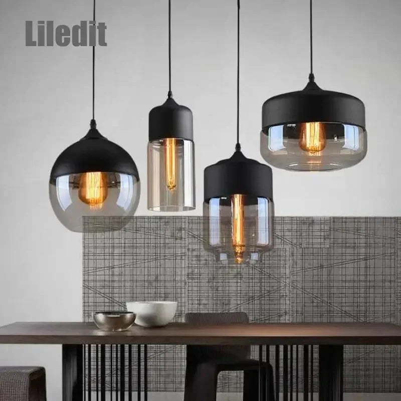 suspension lumineuse moderne pendentif verre noir transparent contemporain fixation câble luminaire salle manger chambre