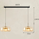 suspension lumineuse moderne transparente dorée câble noir alliage led dimmable certification rohs flux luminescent