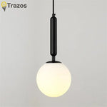 lampe suspension moderne or blanc noir sphérique brillante éclairage chambre salon étude entrée