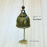 cloches décoratives bronze doré motifs floraux animaux artisanal vintage poisson métal chaîne métallique