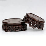 support bois ornements sculptés complexe artisanal marron foncé traditionnel décoration maison objet décoratif stand