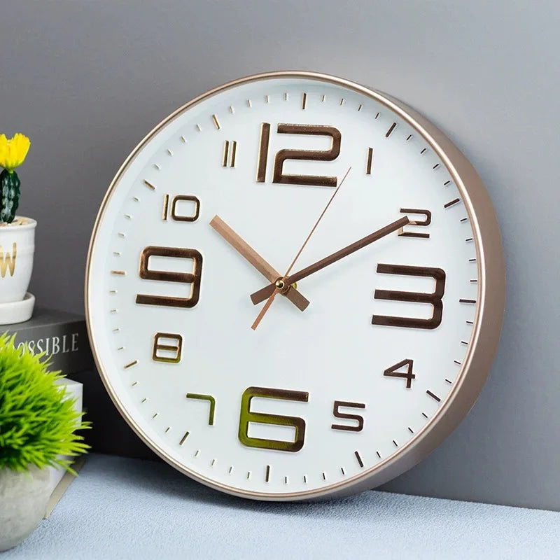horloge murale moderne chiffres relief aiguilles fines blanc rose doré noir minimaliste