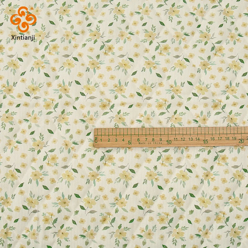 tissu polyester imprimé fleurs jaunes vertes veste hiver rayures horizontales poches col montant bricolage