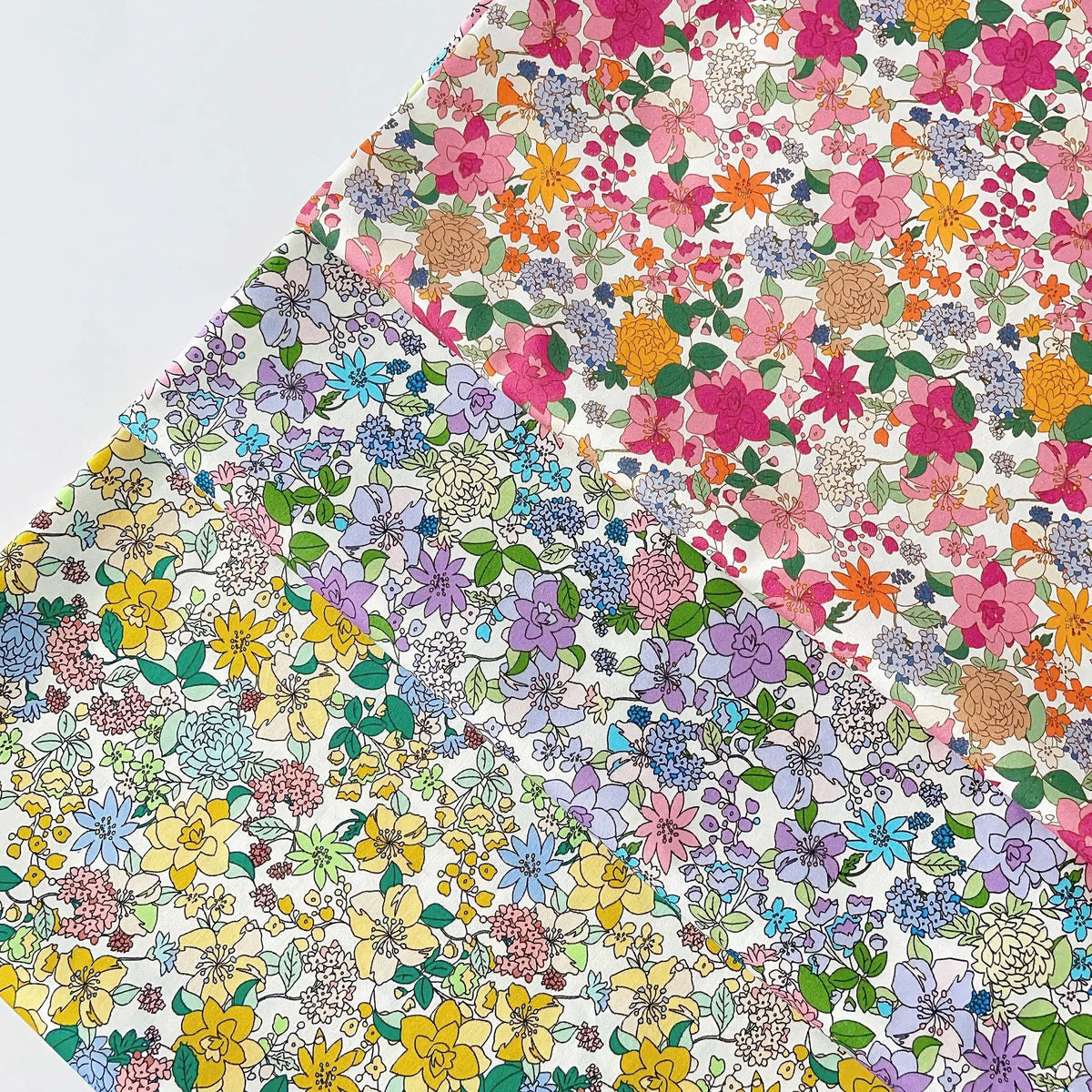 tissu imprimé floral multicolore coton biodegradable popeline 145cm large fleurs feuilles traditionnel decoration bricolage