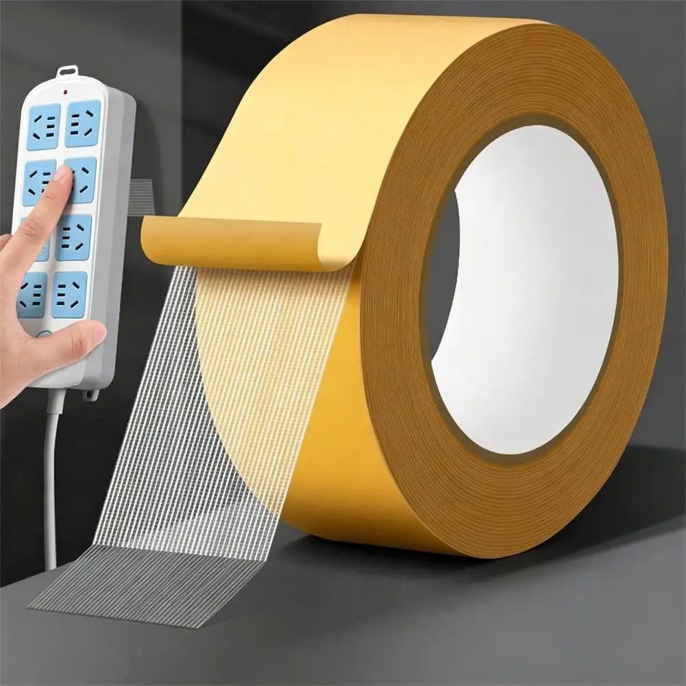 ruban adhésif double face jaune perforations blanches usage intensif imperméable fixations modernes bricolage électrical