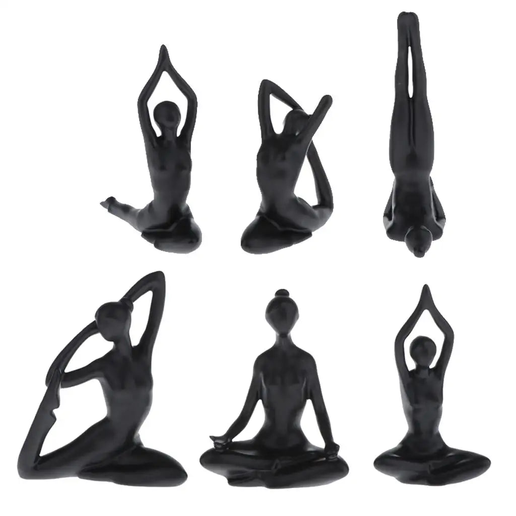ornements deco moderne figurines yoga noires differentes poses minimaliste sculptural