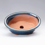 cache pot céramique bleu rose texture granuleuse classique décoration intérieure fleur plante verte non