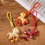 porte clés cheval imprimé motifs floraux caractères chinois violet rouge orange bleu artisanal