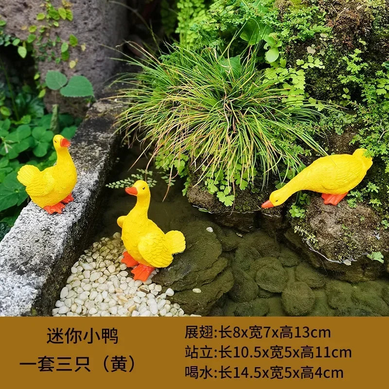 statue canard blanc plumes orange piscine jardin décoration extérieure animaux ornements paysagistes fleurs artificielles